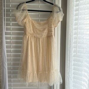 This beautiful pearl dress is perfect for any special occasions.